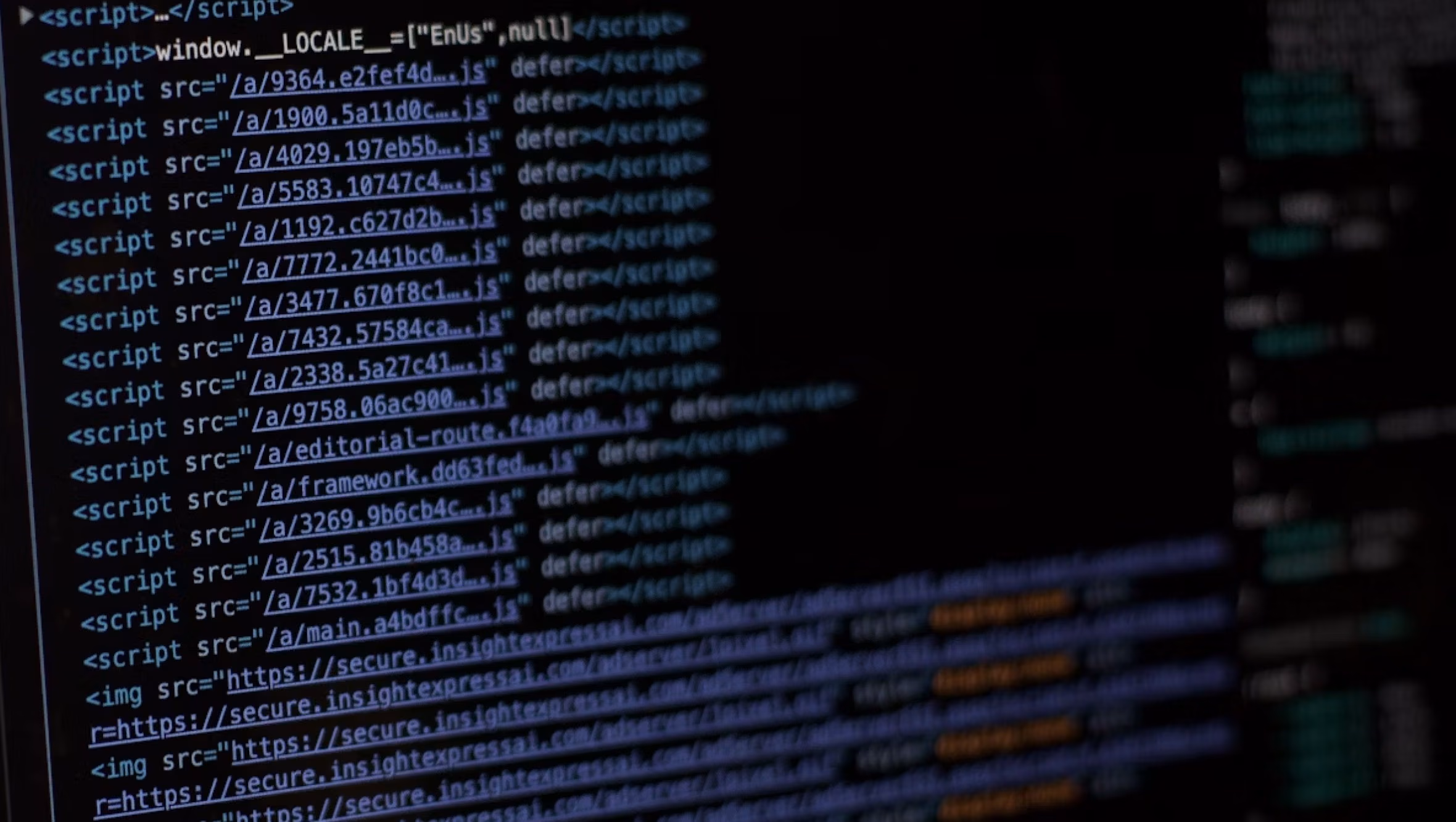 Close-up of website source code on a screen